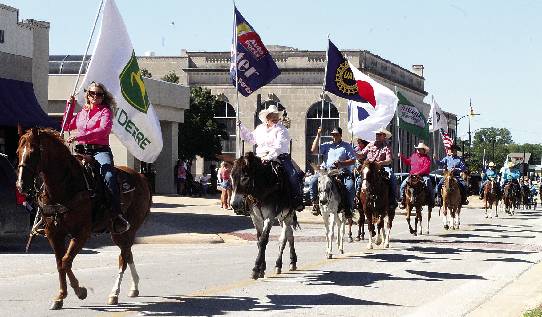 InterState Fair and Rodeo Parade marches through downtown plaza The